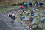 Mike Redmayne gets his first look at the head wall of Dark Continent, E1 5c, Stanage Edge, England.
