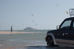 A local watches the kite surfing. Dakhla, Weatern Sahara.