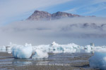 Small ice-bergs stranded by the receding tide, East Greenland.